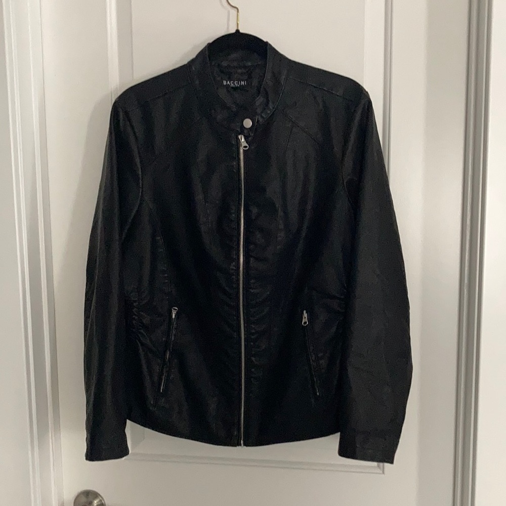 Faux leather fitted waist jacket.